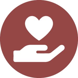 Icon of a white hand holding a heart on a maroon circular background, symbolizing care and support.
