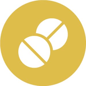 Two white pills with dividing lines on a yellow circular background.