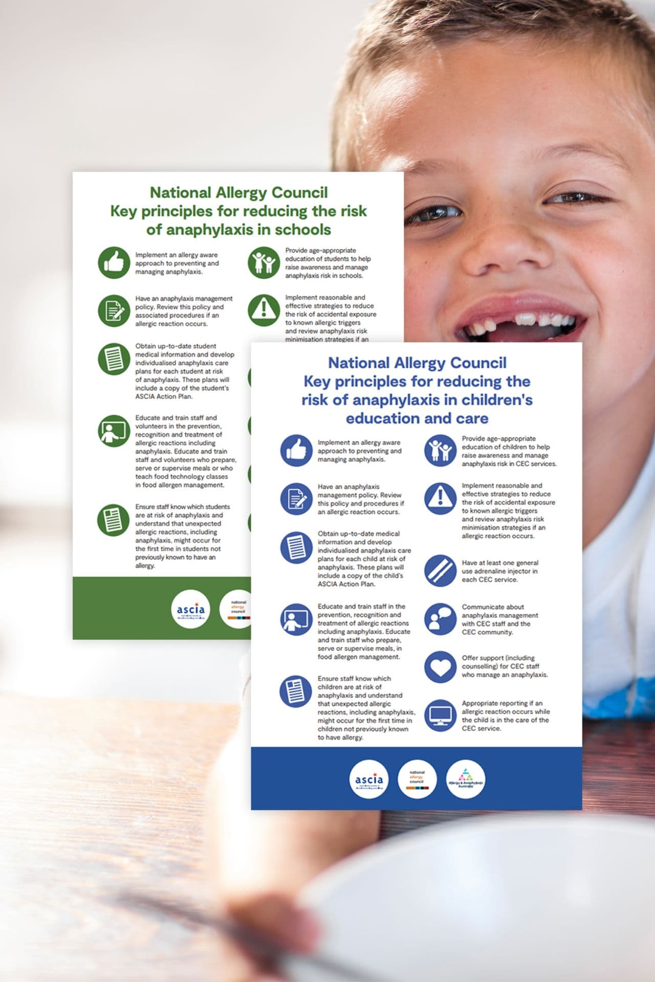 Smiling child with two posters titled "Key principles for reducing the risk of anaphylaxis in schools" and "children's education and care."
