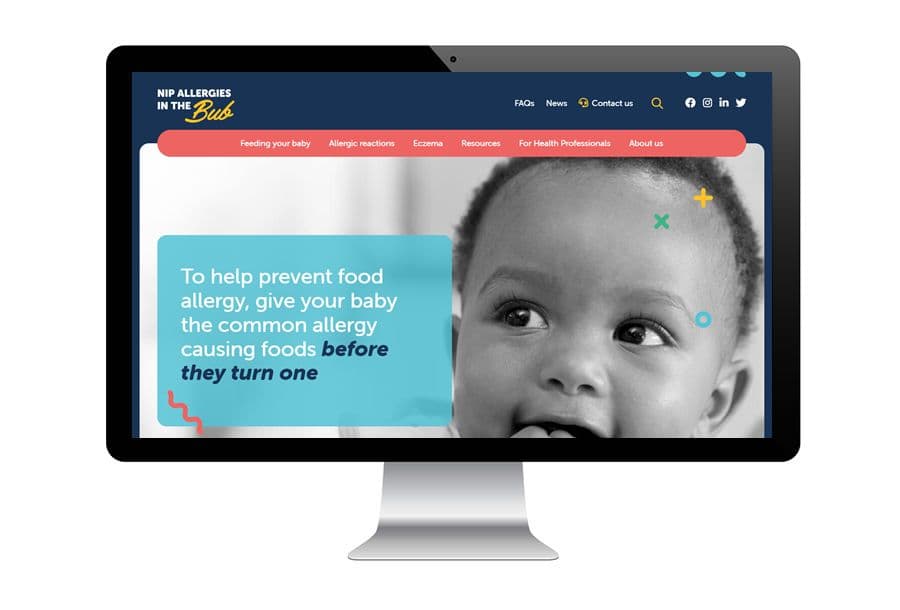 Computer screen displaying the Nip Allergies in the Bub website, providing information about preventing food allergies in babies, featuring a smiling baby and informational text.