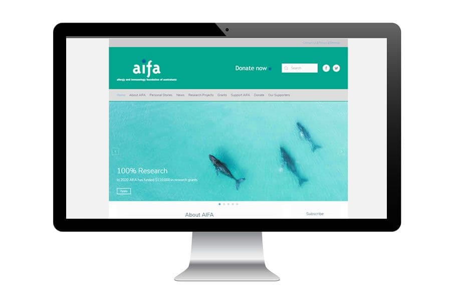 A computer screen displaying the aifa website with a teal header and aerial image of two whales in the ocean.