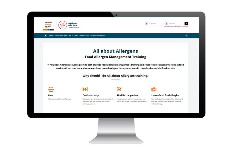 Computer screen displaying a webpage titled "All About Allergens: Food Allergen Management Training" with icons and text about training benefits.